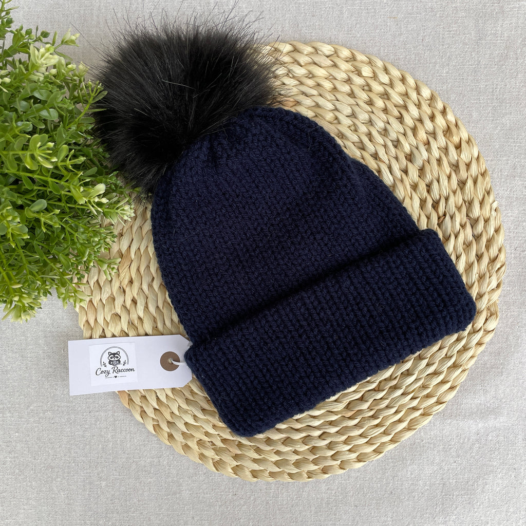 Knitted Beanie with a fluffy pom-pom