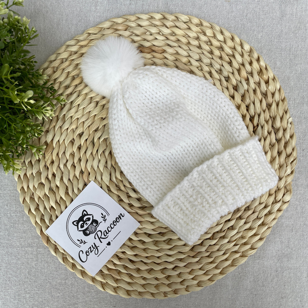 Knitted Kids Beanie with a fluffy pom-pom